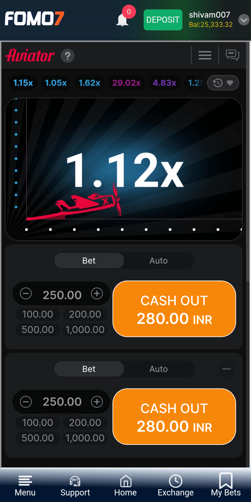 Aviator game screen showing a 1.12x multiplier with bet and cash-out options in the FOMO7 India interface.