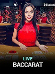 Live baccarat dealer in a bright red dress at a gold table, highlighting real-time gameplay for FOMO7 India.